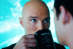lex luthor sips from a coffee cup in 2025's Superman movie